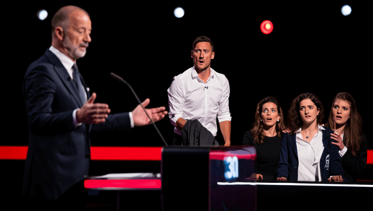 L'Eredità la Sfida tra giganti, top e flop: le professoresse invisibili (5), i segreti di Verdone (9), la ghigliottina sospesa (4), Totti e la cena mancata (7.5)